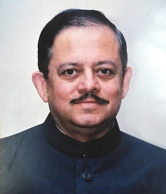 Dr. Tilak