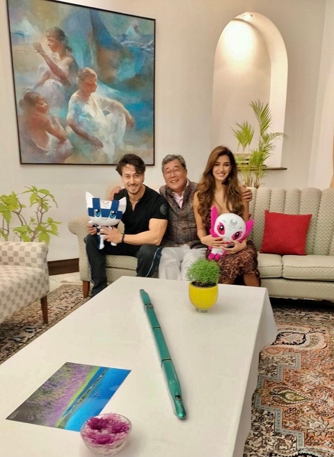 CG Harada, Mr. Tiger Shroff and Ms. Disha Patini with the Olympic mascots and a model of the bullet train